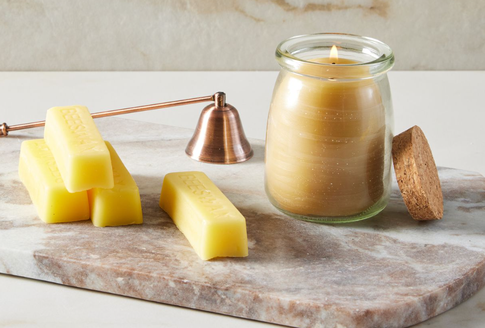 Assorted beeswax candles in a cozy setting